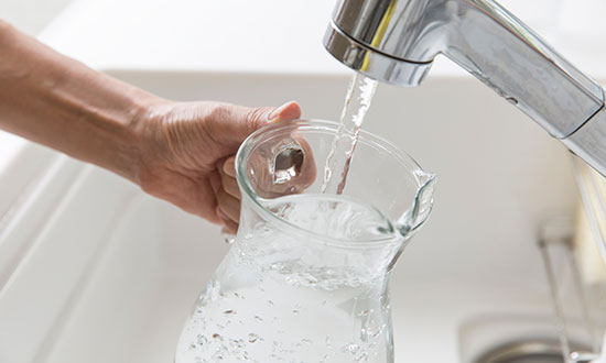 filling-water-pitcher-from-tap