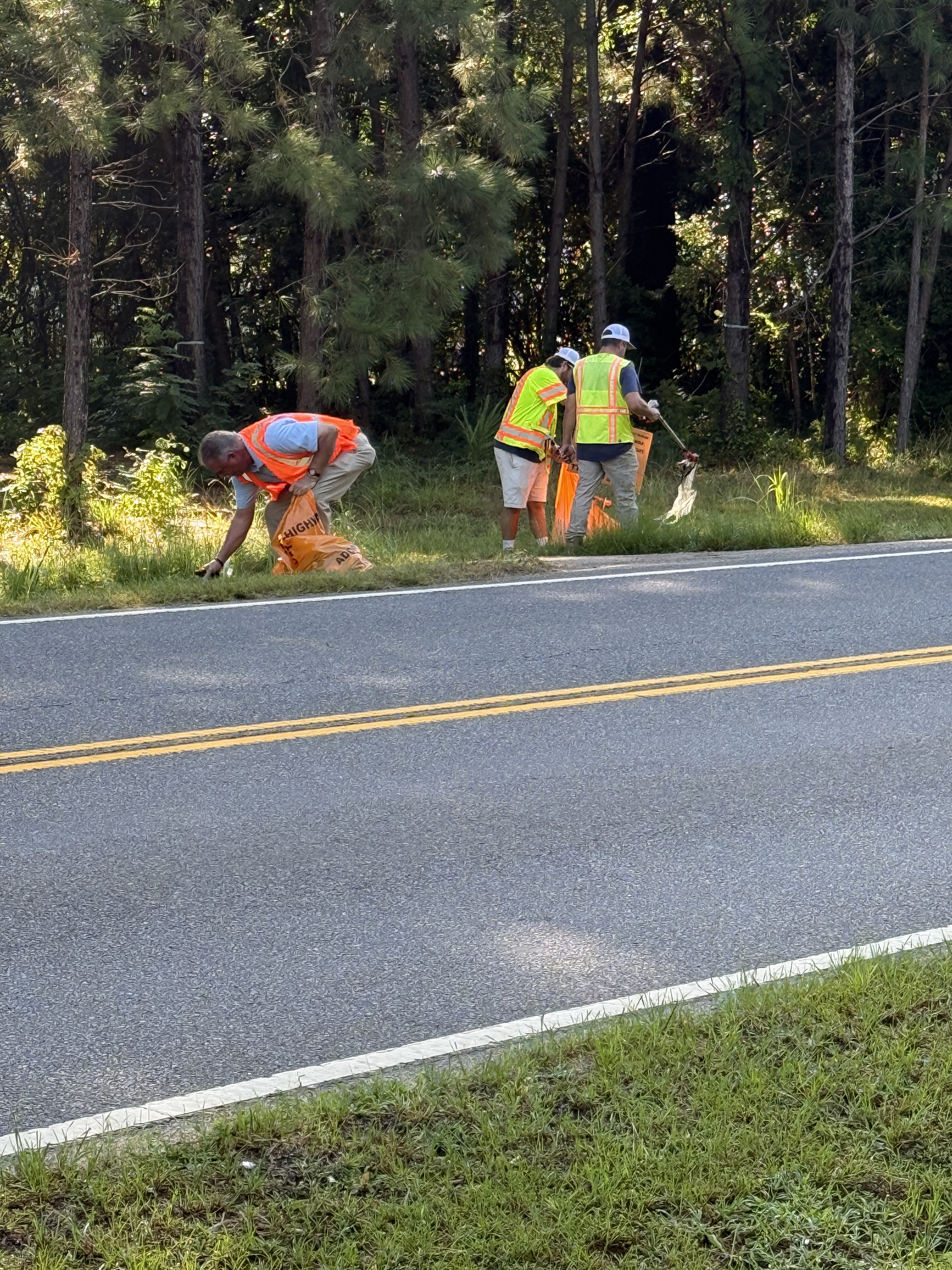 blue granite piedmont trash pick up 3 on side of road no faces