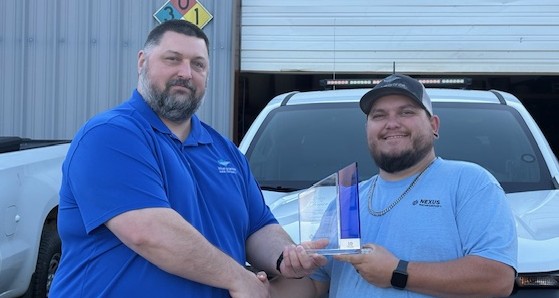 Shane Moore Area Manager on left with Lance Prunty. Lances 10 years with the company award cropped for website