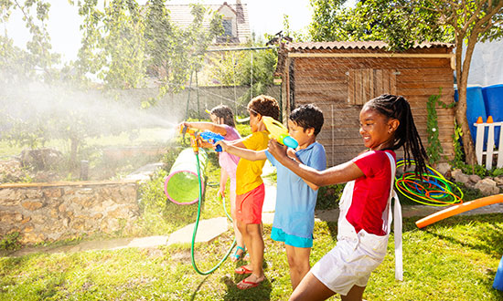 neigborhood-kids-playing-with-water