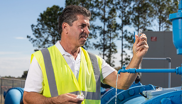 Utility-Worker-Taking-Water-Sample